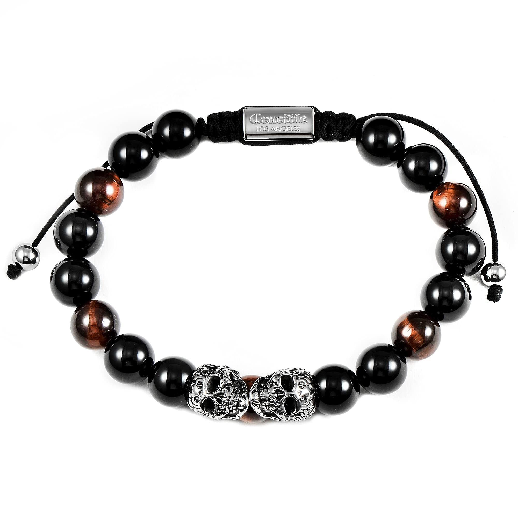 Foto 3 pulgar | Brazalete Crucible Con Doble Calaveras De Acero Inoxidable, Ojo De Tigre Rojo - Venta Internacional.