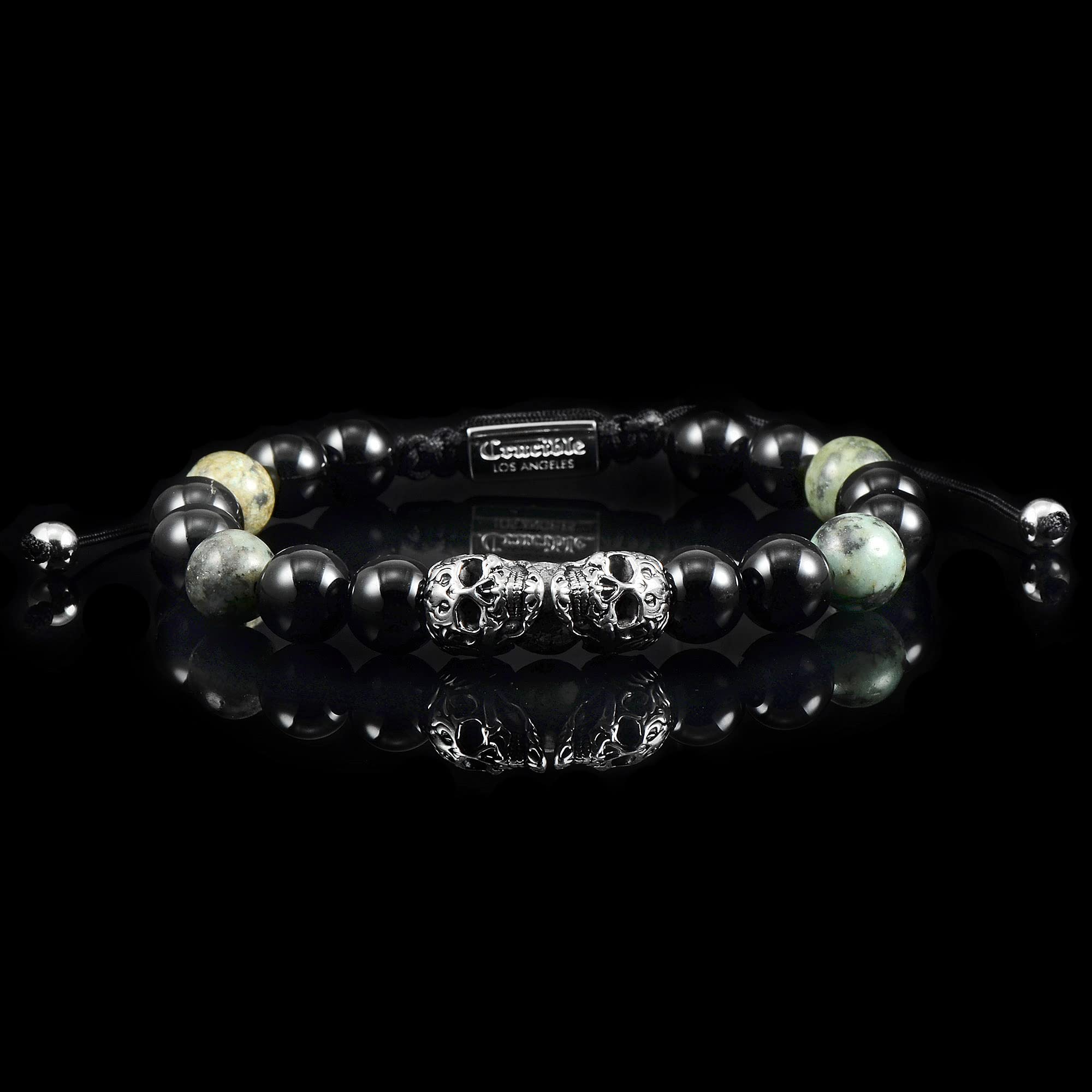 Foto 6 pulgar | Pulsera Crucible Con Calaveras Dobles De Acero Inoxidable Y Turquesa Africana - Venta Internacional.
