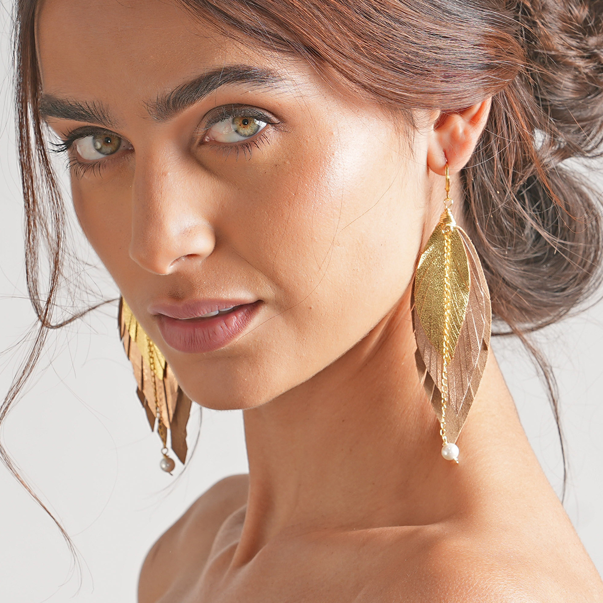 Foto 2 | Aretes Largos Mujer De Plumas Gavilán Joyería Vangania