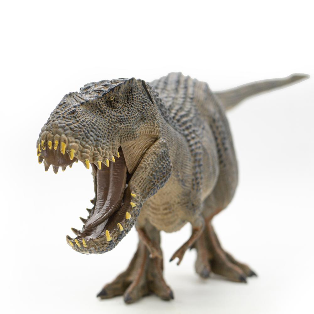 Figura de Tiranosauro Rex Didacti Juegos Jurásico color Gris