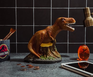 Foto 4 | Banco De Monedas De Cerámica Silver Buffalo Jurassic World T Rex - Venta Internacional.