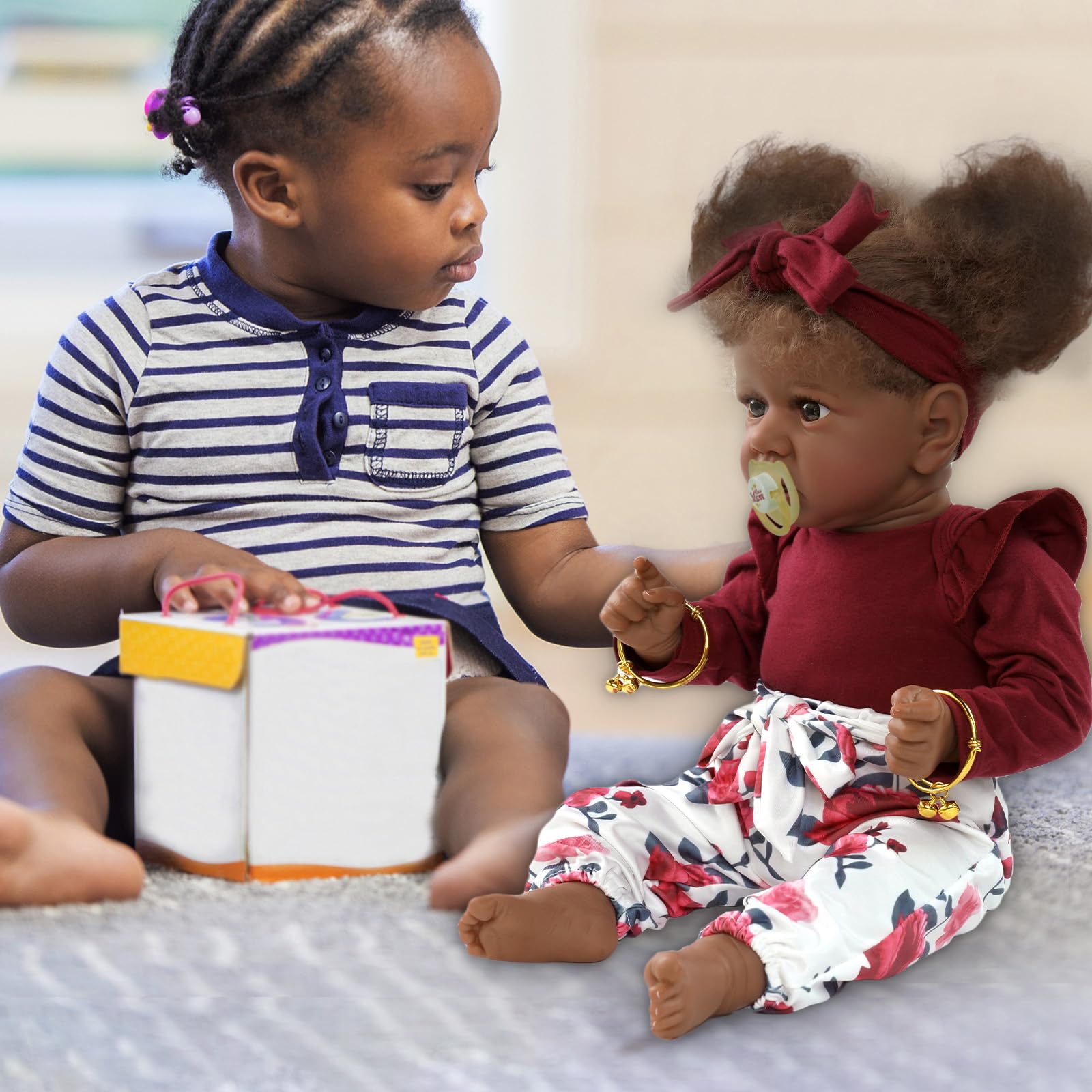 Foto 6 pulgar | Muñeca Reborn Jizhi Negra De 55 Cm Con Accesorios Para Niños Mayores De 3 Años - Venta Internacional.