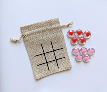 Foto 2 | Set Tic Tac Toe Con Forma De Corazones Para Fiestas De Cumpleaños Con Bolsa Y Guijarros - Venta Internacional.