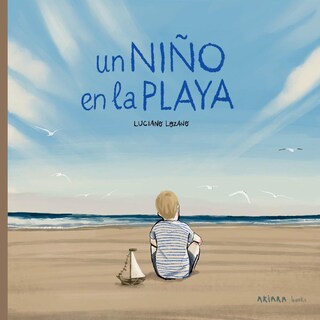 Foto 1 | Un Niño En La Playa