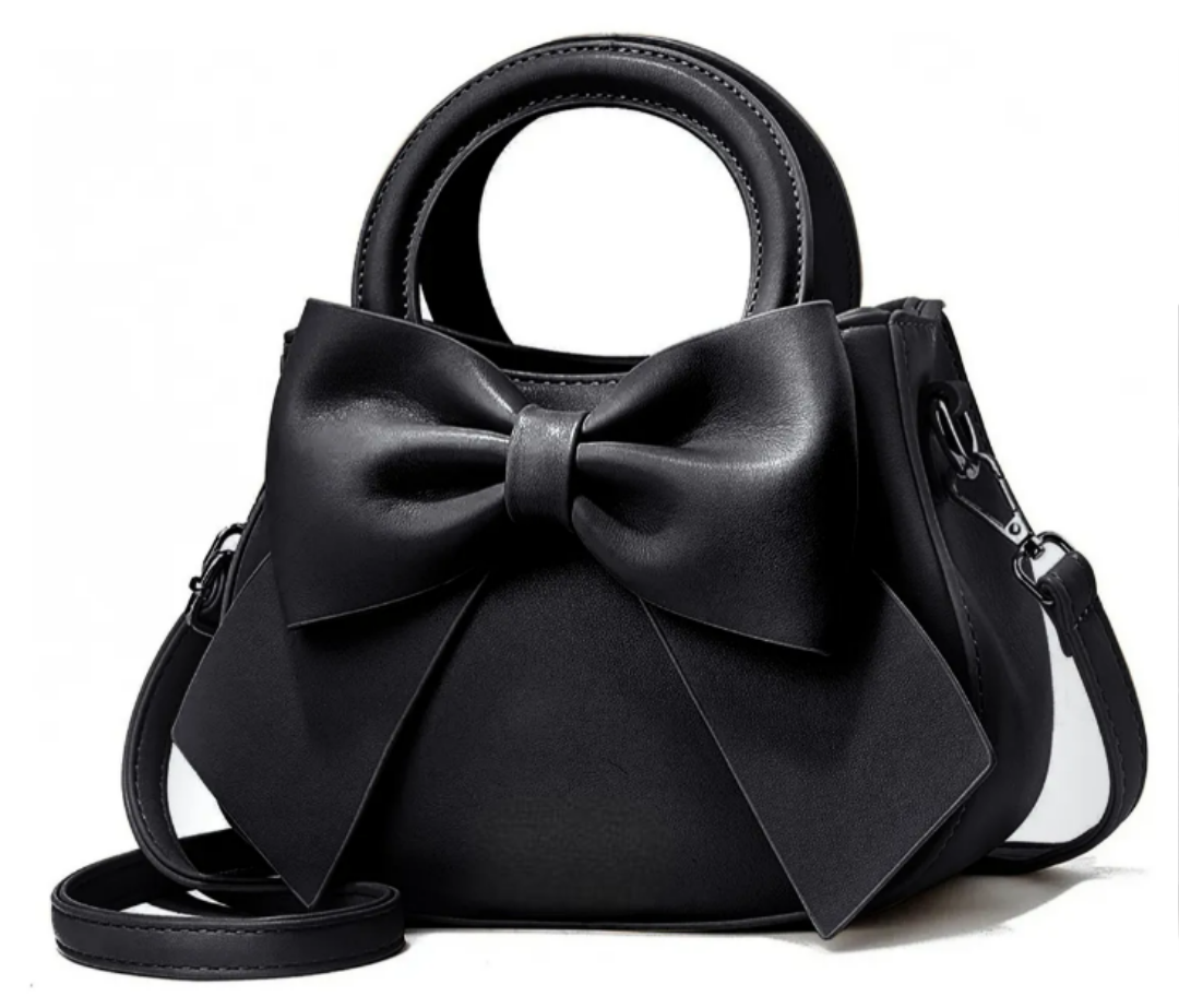 Foto 1 | Bolso Bandolera De Piel ''xtellar'' Con Sofisticado Lazo, Acabado En Níquel Y Correa De Hombro, Color Negro.
