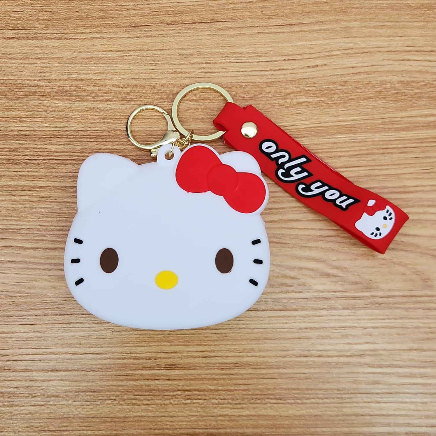 Foto 4 pulgar | Set Hello Kitty -audifonos Con Funda, Llavero Y Reloj Para Niños