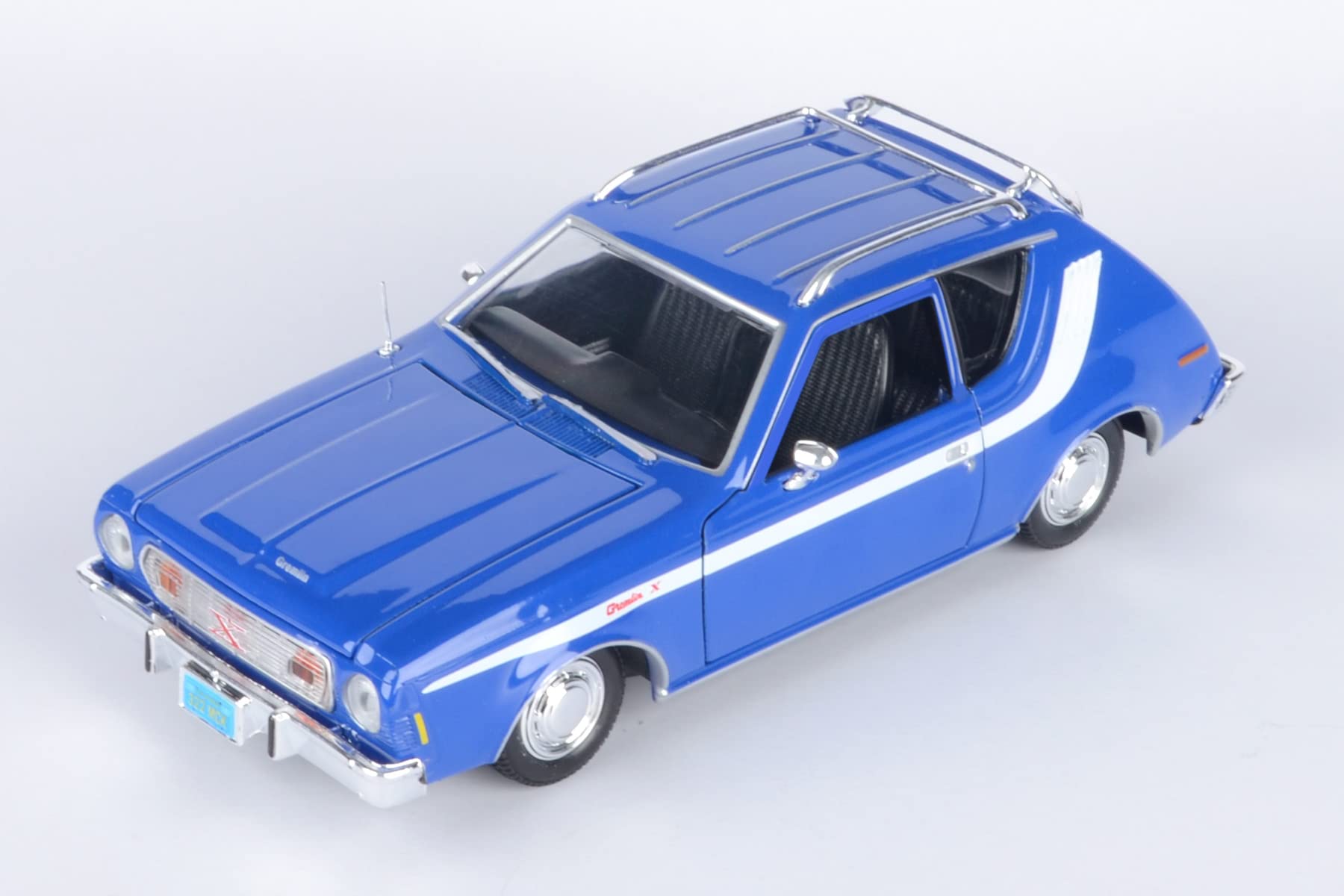 Foto 6 pulgar | Maqueta De Coche Fundido A Presión Motormax 1974 Amc Gremlin X Escala 1:24 Azul - Venta Internacional.