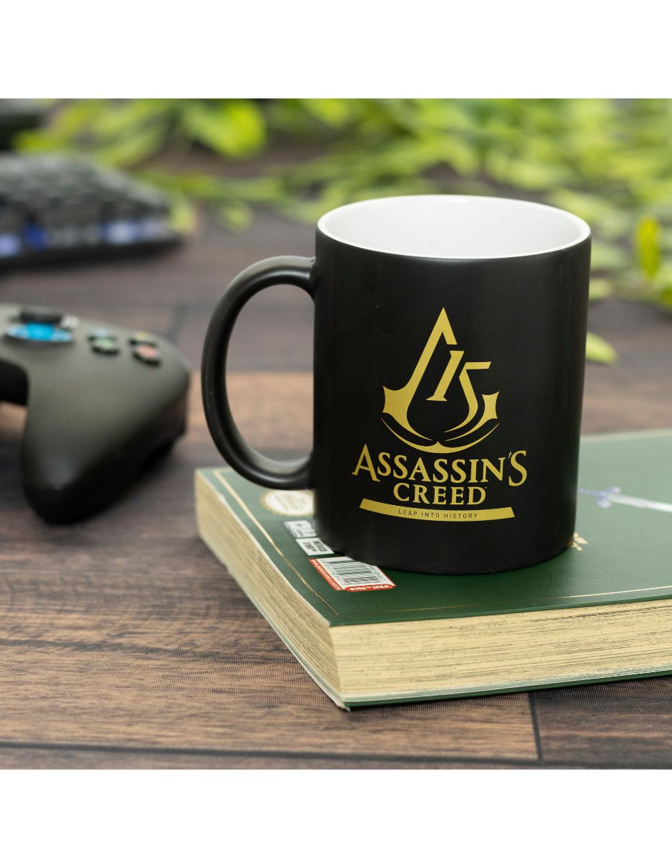 Foto 5 pulgar | Taza Mágica Assassins Creed 15th Anniversary Golden