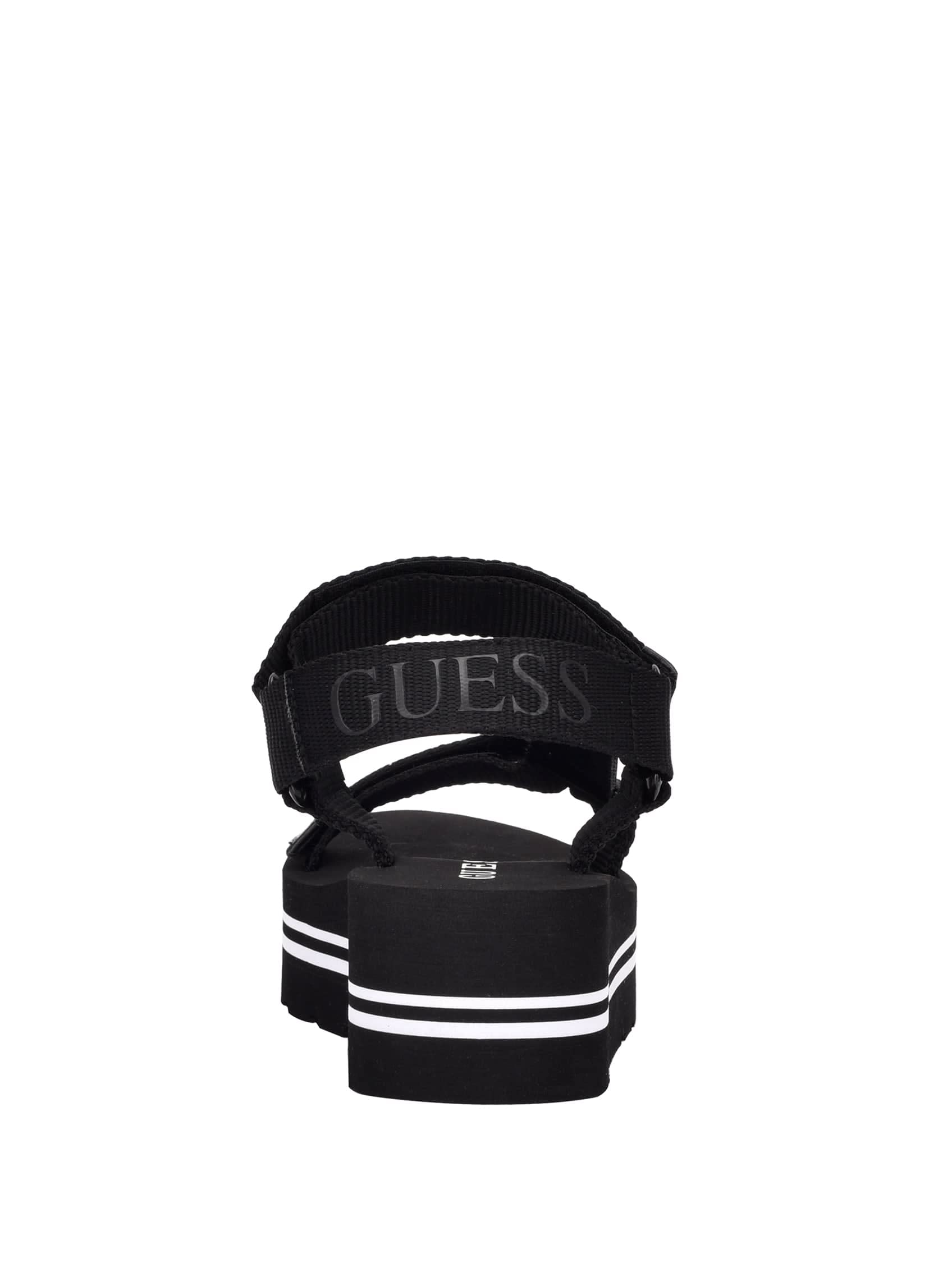 Foto 4 pulgar | Sandalia Con Cuña Guess Avin Para Mujer, Color Negro - Venta Internacional.