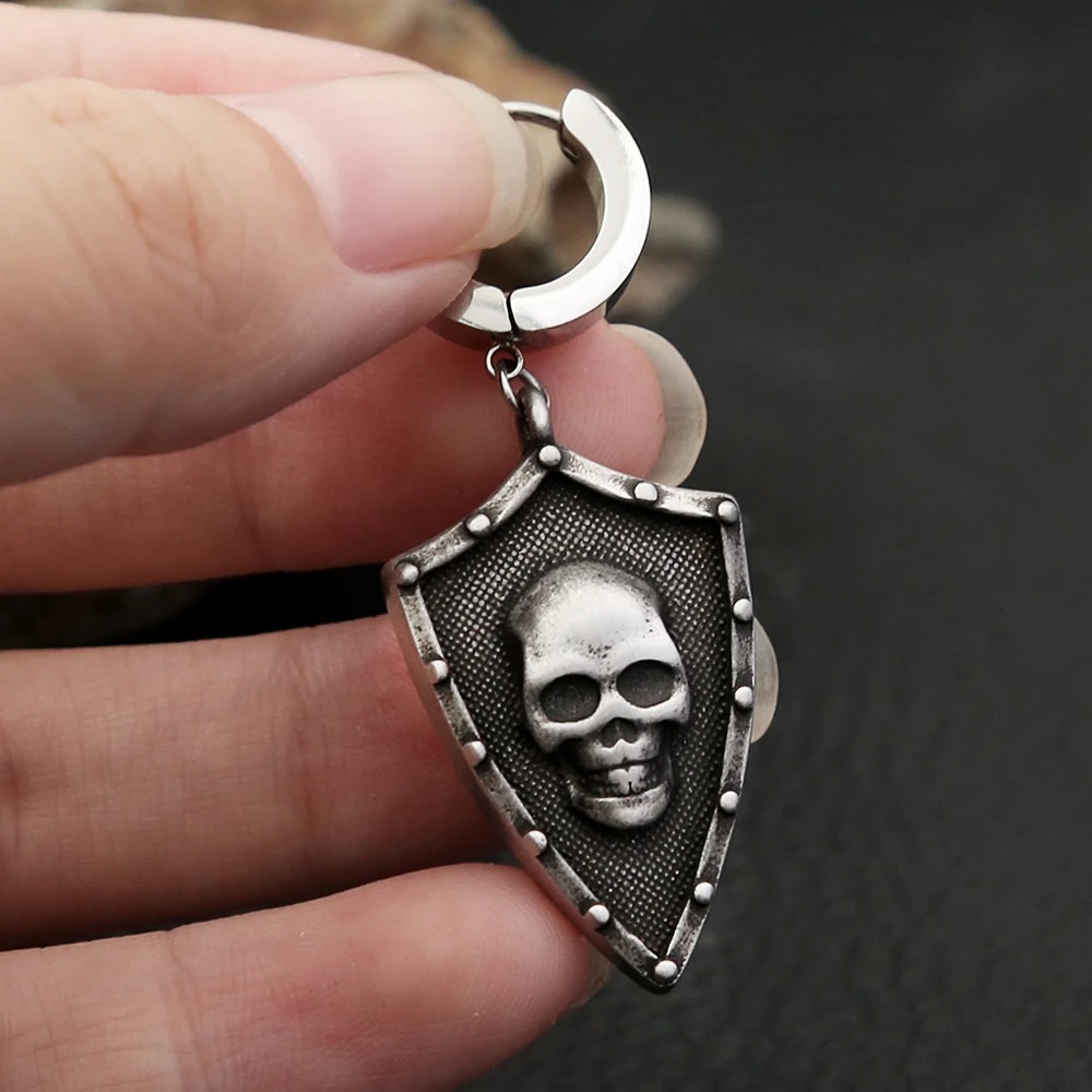 Foto 3 pulgar | Aretes Chulada  Escudo Calavera De Acero Inoxidable Hipoalergénico