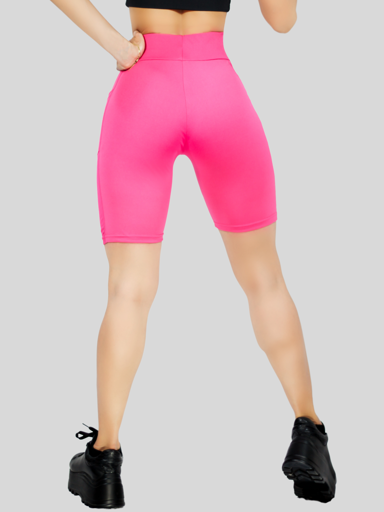 Foto 6 pulgar | Short Deportivo Stretch color Fucsia con Bolsas Laterales