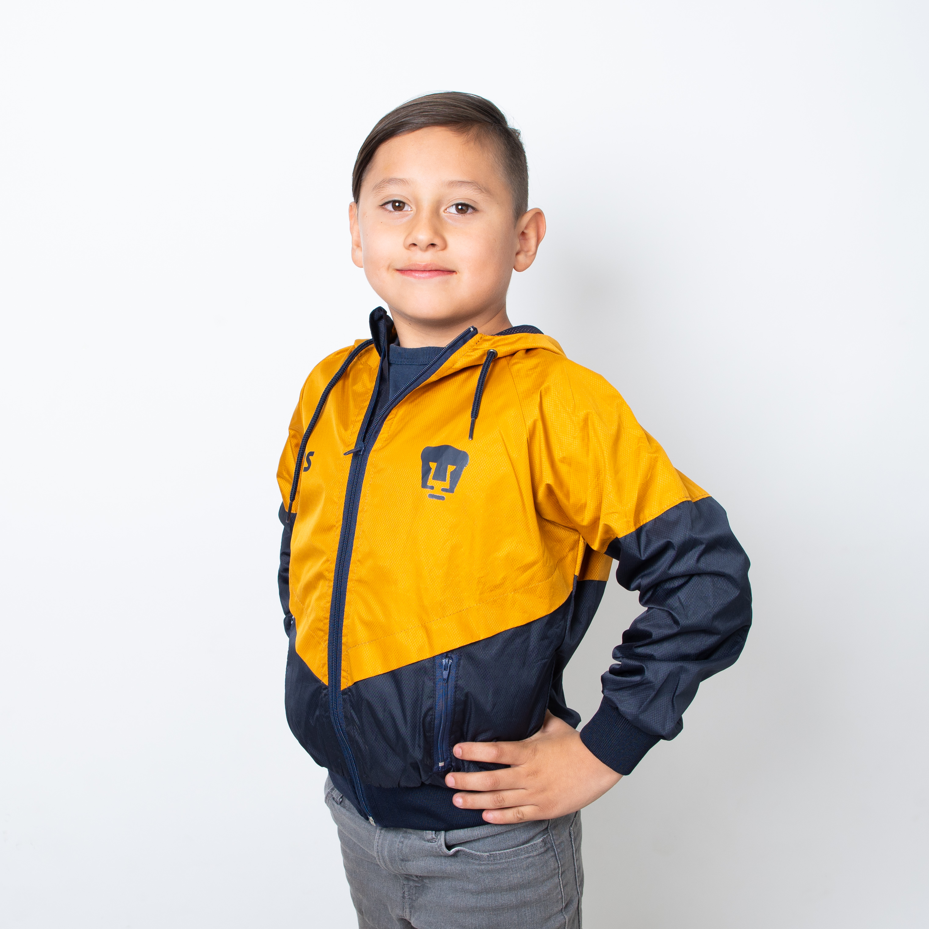 Chamarra Rompevientos Pumas Diseño Oficial en Oro y Azul Infantil