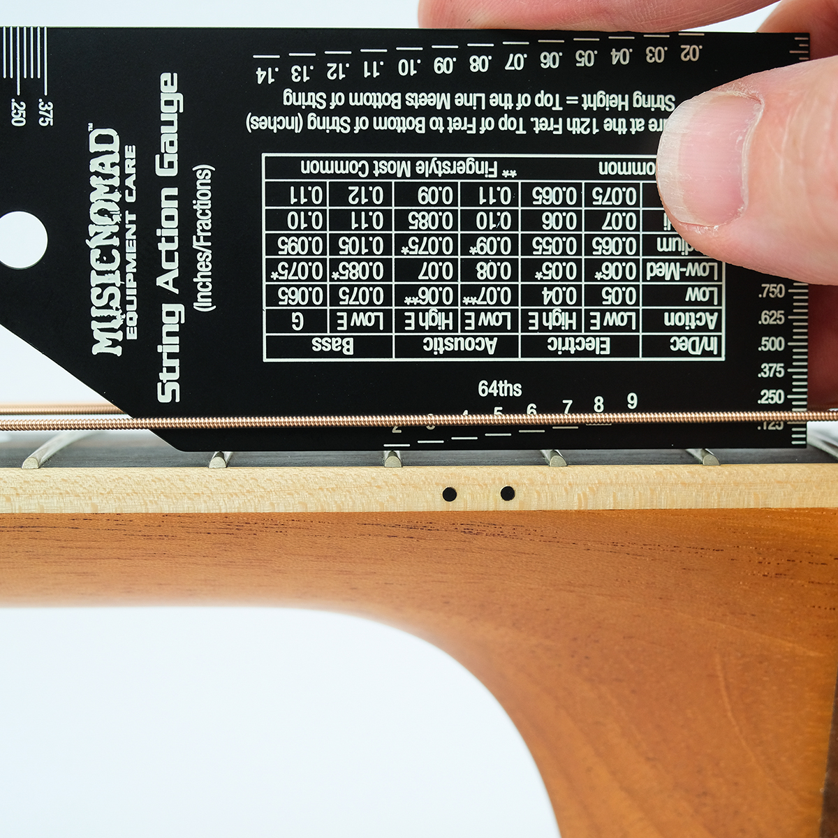 Foto 3 pulgar | Regla de Ajuste Music Nomad Mn602 para Calibración De Guitarra Bajo