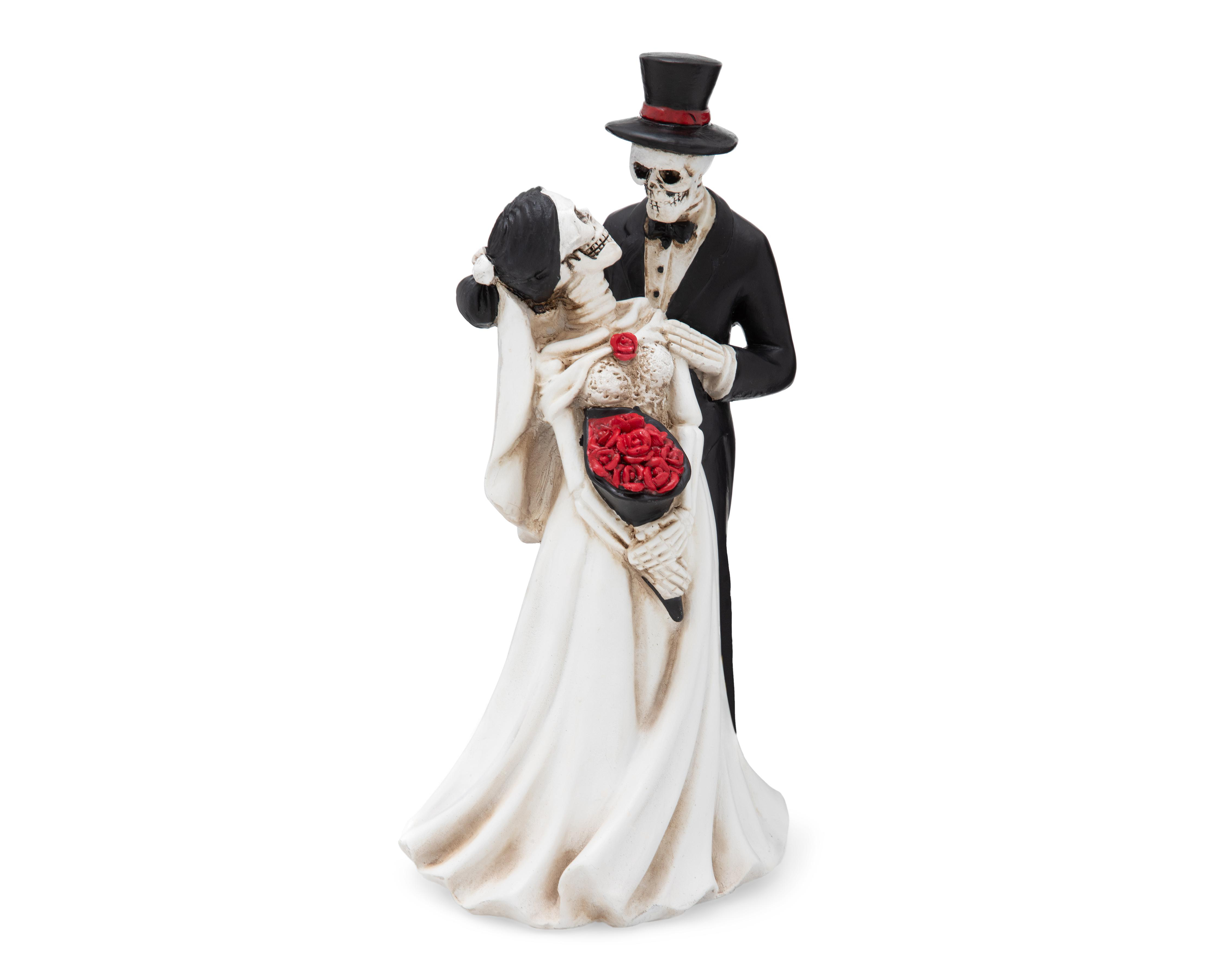 Escultura de Calaveras Lovers