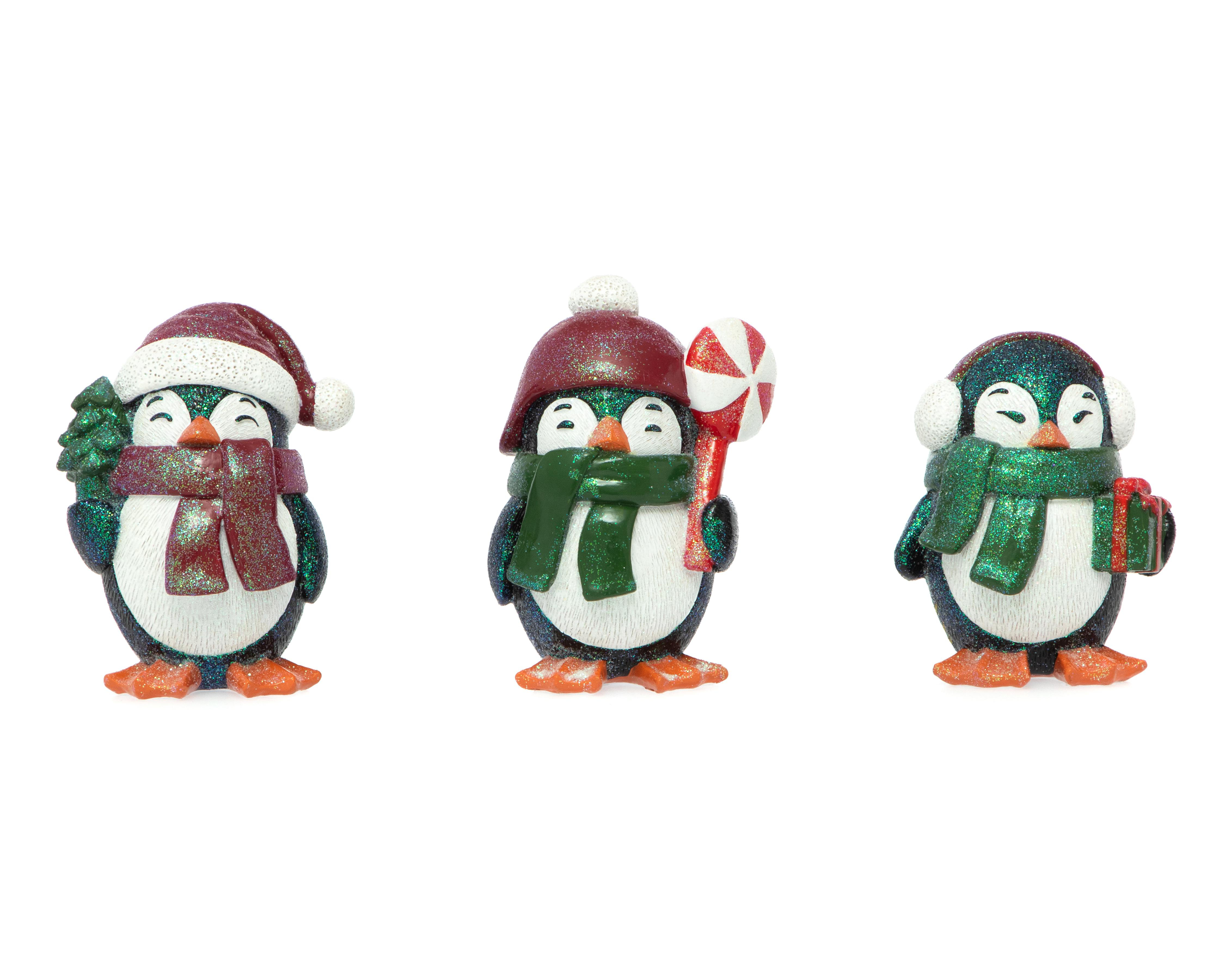 Esculturas de Pingüinos Triwinos de Resina $59