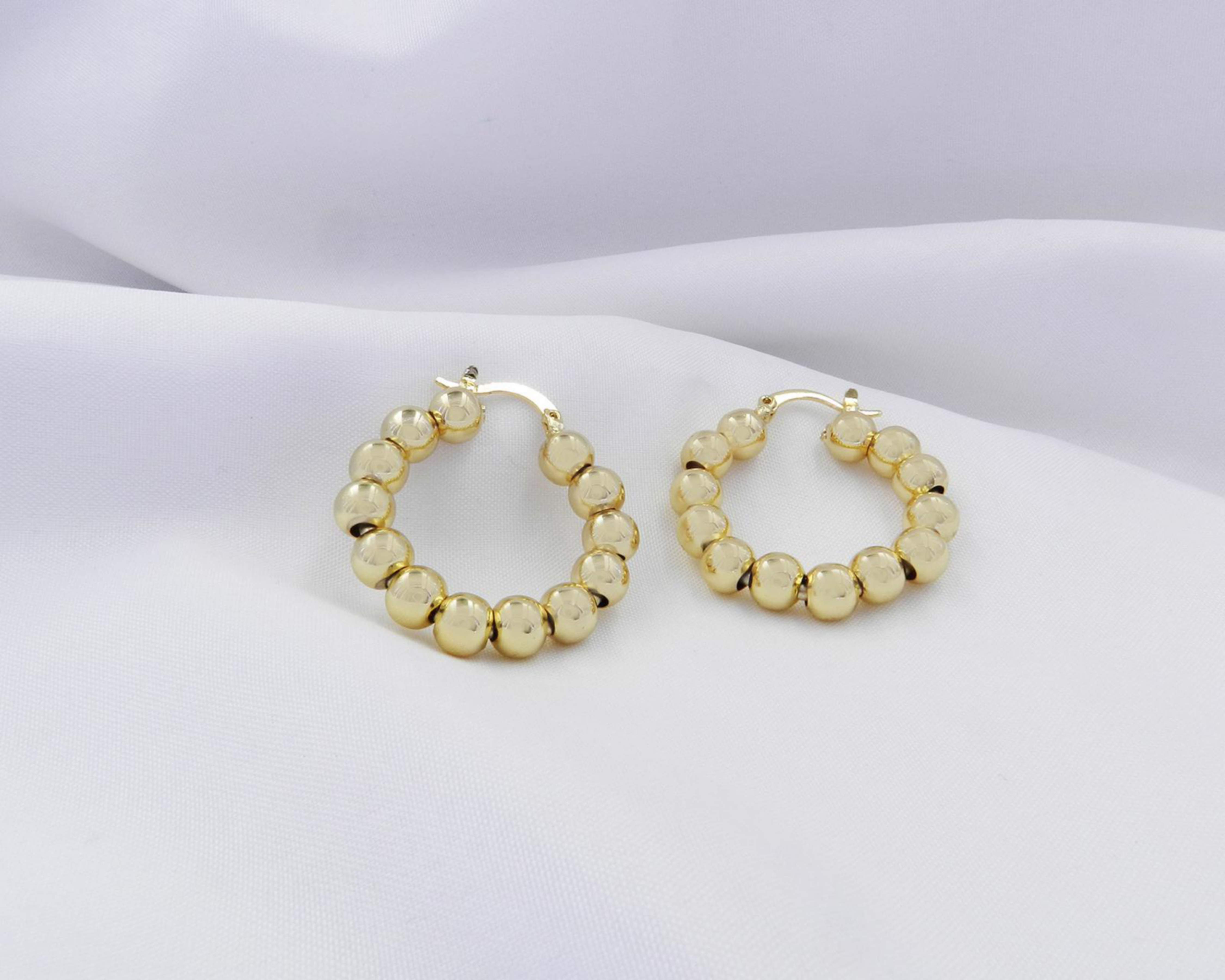 Foto 5 pulgar | Arracadas de Chapa de Oro 18K Diseños Creativos