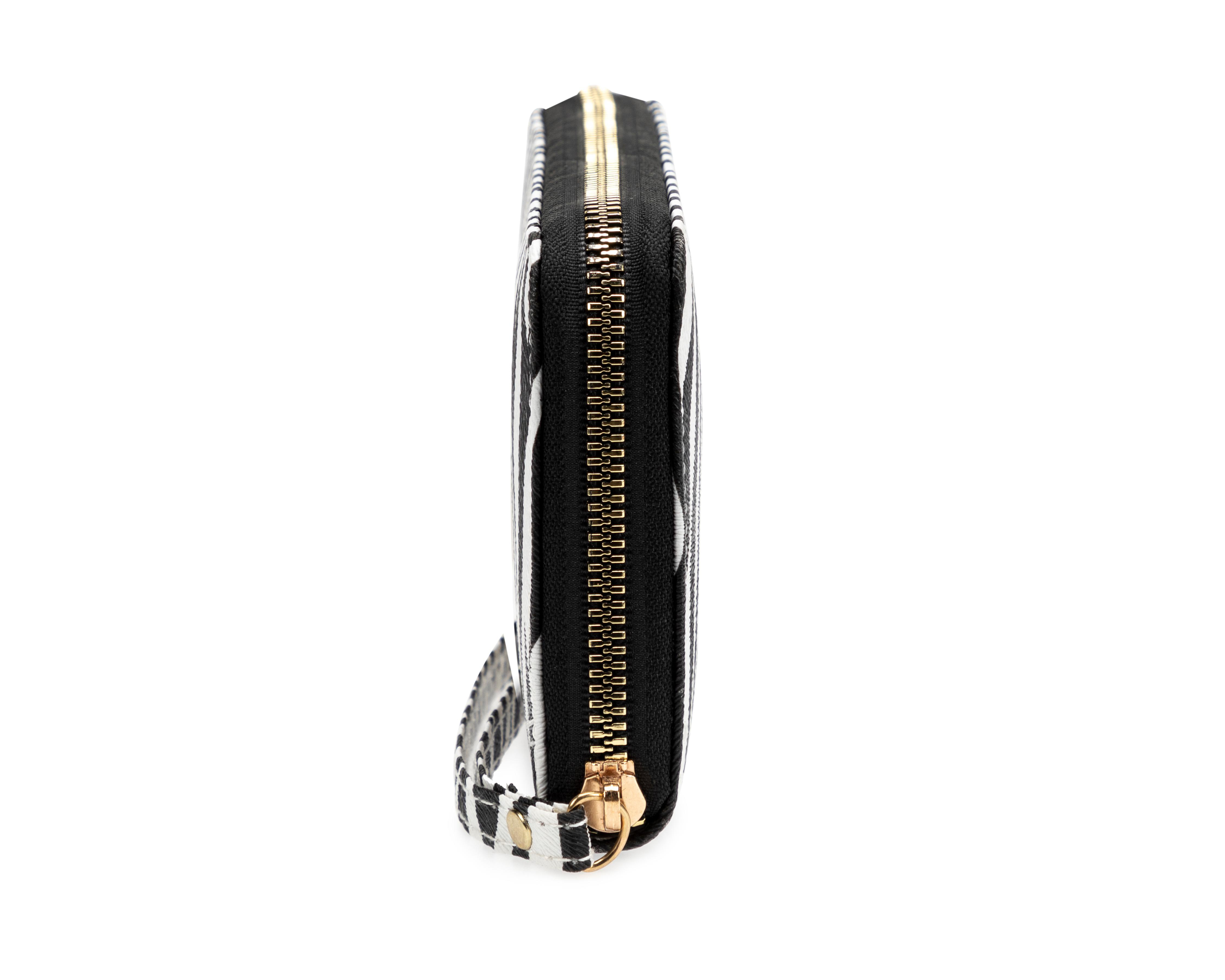 Foto 4 pulgar | Cartera Thinner