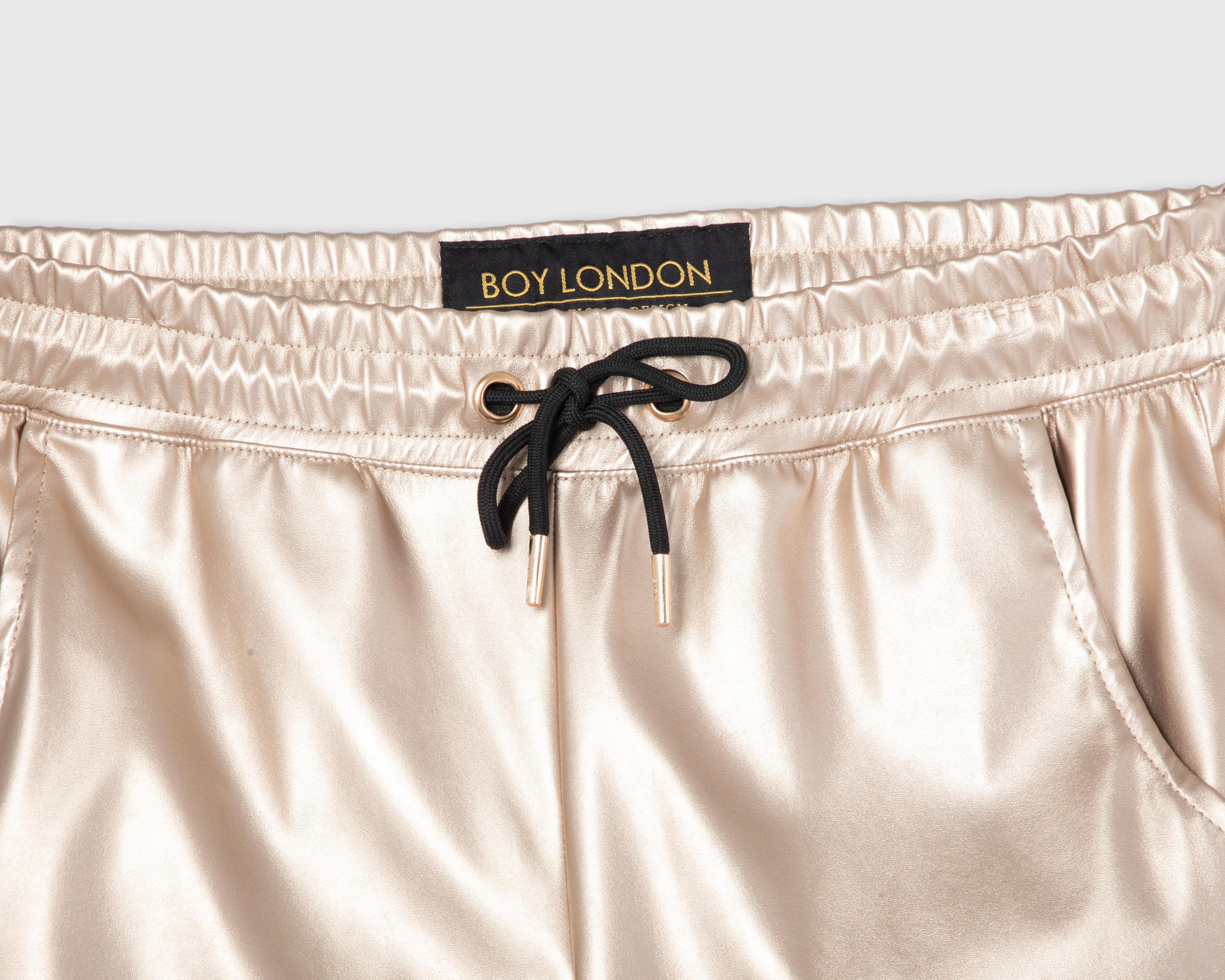 Foto 4 pulgar | Jogger Boy London Dorado