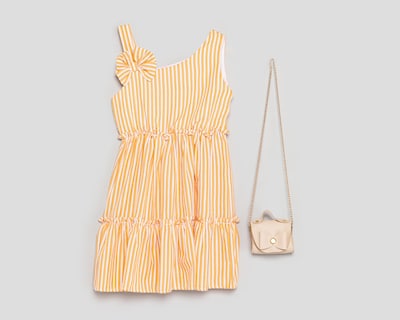 Foto 1 | Vestido Anaranjado Telitas para Niña con Bolsa