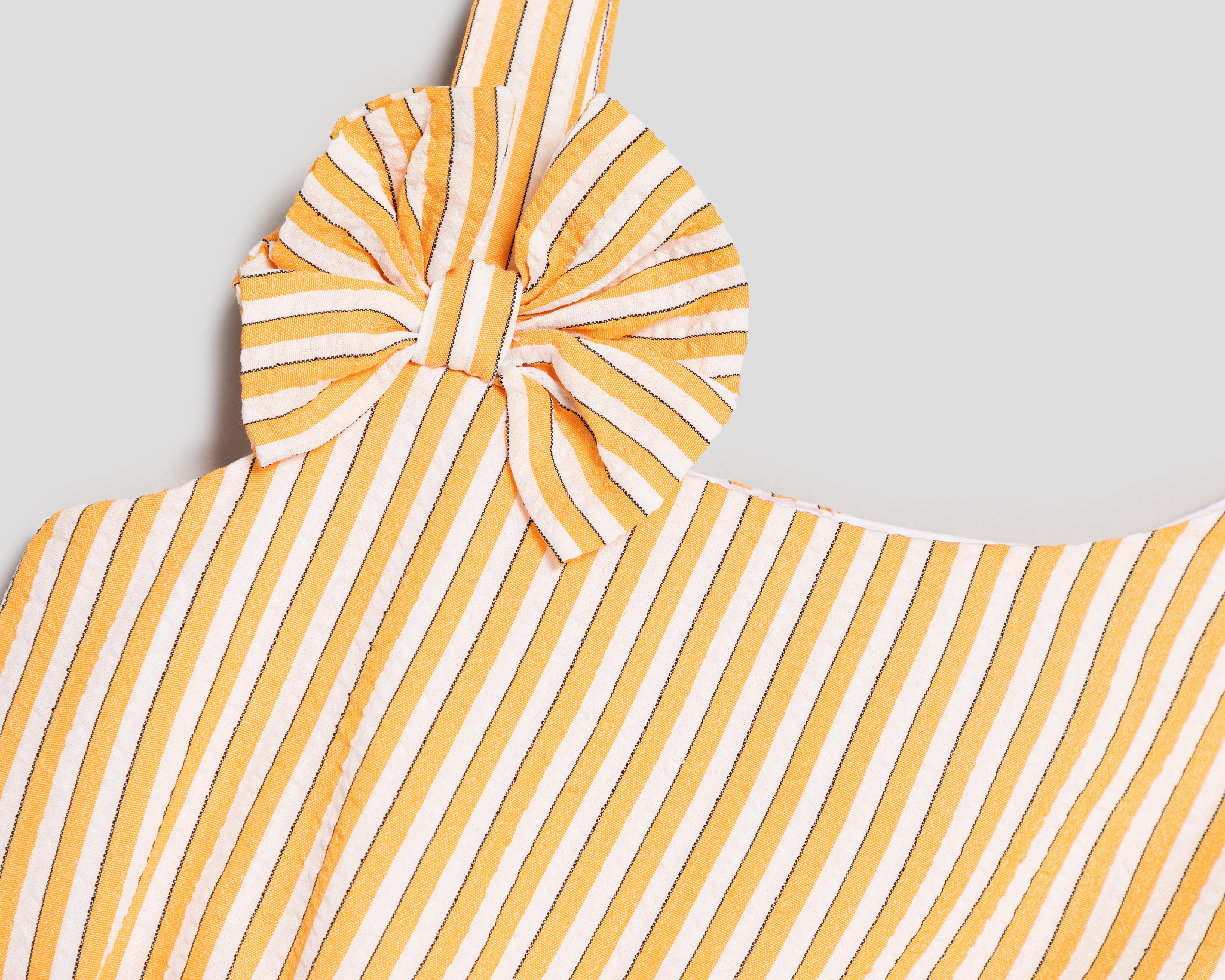 Foto 4 pulgar | Vestido Anaranjado Telitas para Niña con Bolsa